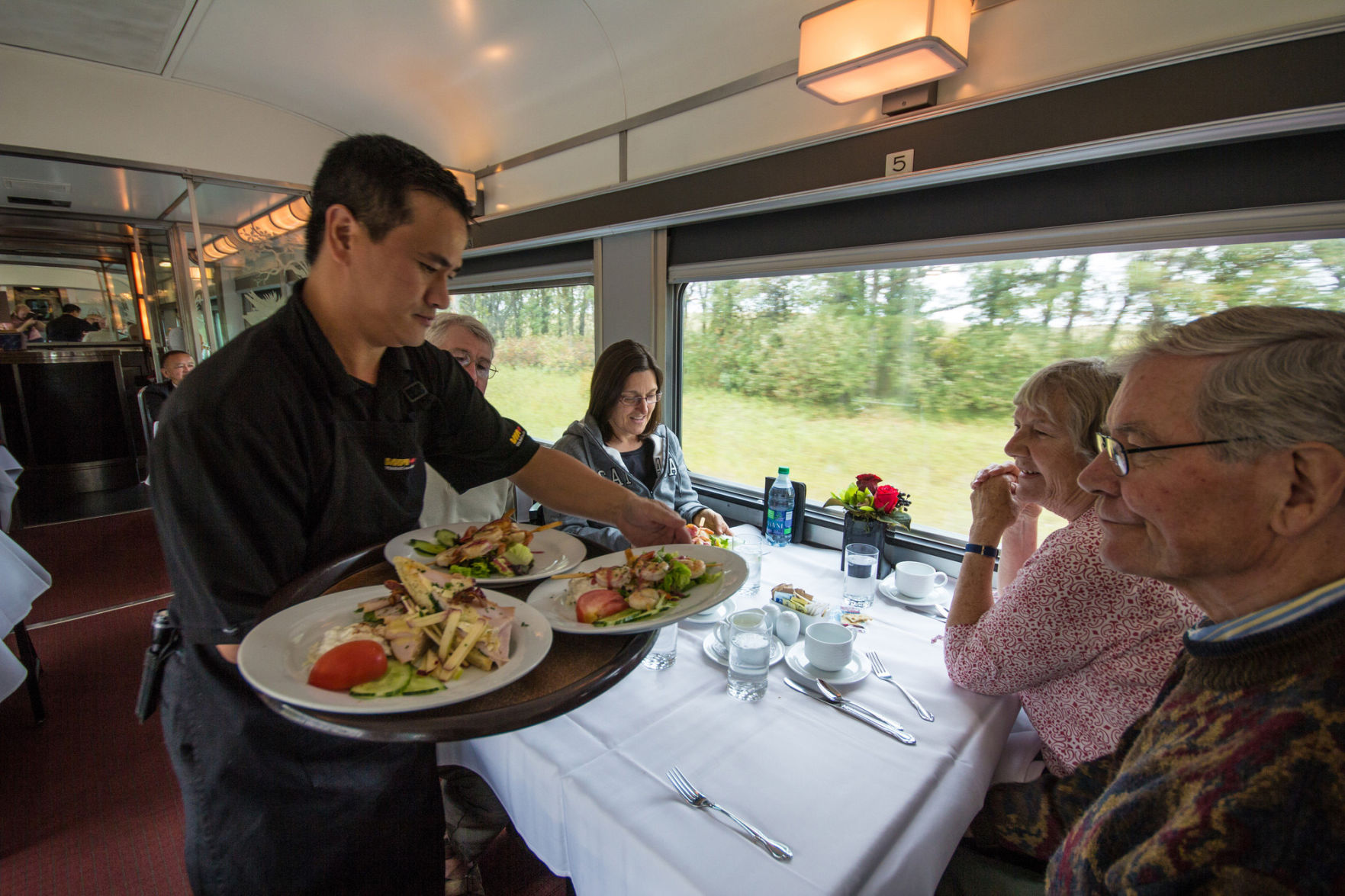 Food being served in the dining car on Via Rail's Canadian.
